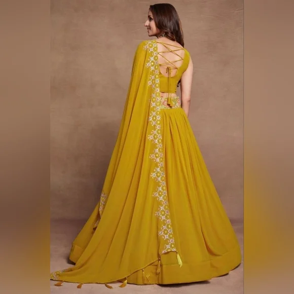 Yellow Sequined Embroidered Work Faux Georgette Fabric Flared Lehenga Choli - Picture 2 of 14